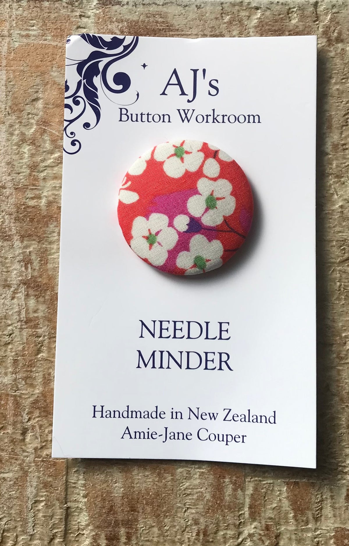 Needle Minder Red White Flower